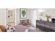 Cozy bedroom with a dresser and natural light and modern decor at 2437 Spring Tune Aly, Kissimmee, FL 34744