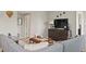 Comfortable living room with stylish furnishings and a neutral color palette at 2437 Spring Tune Aly, Kissimmee, FL 34744