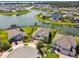 A captivating aerial view of a lakeside community, featuring well-maintained homes and waterfront docks at 4950 Chase Ct, St Cloud, FL 34772
