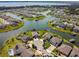 Panoramic aerial shot of a residential area situated on a peninsula with waterfront homes at 4950 Chase Ct, St Cloud, FL 34772