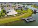 Gorgeous backyard with patio and private boat dock offering direct lake access and endless outdoor fun at 4950 Chase Ct, St Cloud, FL 34772