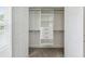 Spacious closet with ample storage solutions, including shelving and drawers, maximizing organization at 4950 Chase Ct, St Cloud, FL 34772