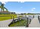 Private boat dock equipped with a lift system provides convenience for waterfront living and boating activities at 4950 Chase Ct, St Cloud, FL 34772