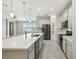 Bright kitchen featuring an island, stainless steel appliances, and a walk-in pantry at 4950 Chase Ct, St Cloud, FL 34772