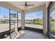 Enclosed lanai offering panoramic water views and outdoor living at 4950 Chase Ct, St Cloud, FL 34772