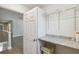 Upstairs laundry room with granite counter and shelving at 4950 Chase Ct, St Cloud, FL 34772