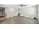 Upstairs living area with modern fan and views of the front yard at 4950 Chase Ct, St Cloud, FL 34772