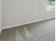 Bedroom with grey carpet and view out window of lake at 6690 Wake St, St Cloud, FL 34771