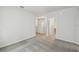 Upstairs bedroom with neutral carpeting and views to the landing at 6690 Wake St, St Cloud, FL 34771
