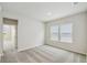 Bright bedroom with plush carpet and windows offering plenty of natural light at 6690 Wake St, St Cloud, FL 34771