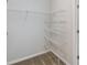 Walk-in closet with wire shelving and doorway at 6690 Wake St, St Cloud, FL 34771
