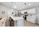 Contemporary kitchen with stainless steel appliances, ample counter space, and an island at 3839 White Ibis Rd, Lakeland, FL 33811