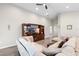 Spacious living room with a large sectional couch and entertainment center at 3839 White Ibis Rd, Lakeland, FL 33811