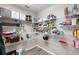 Walk-in pantry with an abundance of shelving for optimal storage and organization at 3839 White Ibis Rd, Lakeland, FL 33811