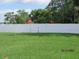 Fenced backyard featuring a well-maintained lawn, a secure perimeter, and plenty of room for landscaping at 206 Samantha Ave, Auburndale, FL 33823
