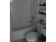 Bright bathroom featuring a clean bathtub with a white tile surround and updated vanity at 206 Samantha Ave, Auburndale, FL 33823