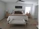 Comfortable main bedroom featuring a plush bed, ambient lighting, and coordinated décor at 206 Samantha Ave, Auburndale, FL 33823