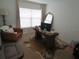 Functional office space with a modern desk, comfortable chair, and natural light at 206 Samantha Ave, Auburndale, FL 33823