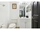 Bathroom with white vanity, framed mirror, with a classic, simple design at 4422 Evergreen Forest Loop, Kissimmee, FL 34758