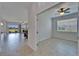 Open-concept living area with tiled floors, natural light, and seamless flow to the outdoor space at 2612 Canyon Crest Dr, Lakeland, FL 33811