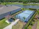 Aerial view of tennis court, pond and pavilion at 2612 Canyon Crest Dr, Lakeland, FL 33811