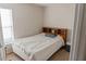 Carpeted bedroom with natural light from the window at 451 Peace Ct, Kissimmee, FL 34759