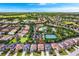 Wonderful aerial view of the Solterra Resort community, showcasing the neighborhood and amenities at 5247 Wildwood Way, Davenport, FL 33837
