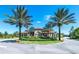 A picturesque view of the gate house, a beautiful entry to the neighborhood at 5247 Wildwood Way, Davenport, FL 33837