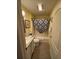 Clean bathroom with a shower and tub, and vanity with ample storage space at 9345 Se 171St Le Flore Ln, The Villages, FL 32162