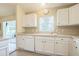 Clean, well-maintained kitchen featuring ample counter space and storage at 9345 Se 171St Le Flore Ln, The Villages, FL 32162