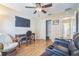 Comfortable living room with wood floors, and a workspace at 9345 Se 171St Le Flore Ln, The Villages, FL 32162