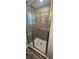 Modern bathroom featuring a glass-enclosed shower with stylish tile work at 1318 Herschell St, Lakeland, FL 33815