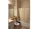Condo bathroom with tub/shower combo, toilet, and vanity sink at 12849 Madison Pointe Cir # 204, Orlando, FL 32821