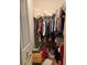 Walk-in closet with clothing rod and shelves, and flooring visible at 12849 Madison Pointe Cir # 204, Orlando, FL 32821