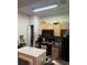 Condo kitchen with black appliances and wood cabinetry at 12849 Madison Pointe Cir # 204, Orlando, FL 32821
