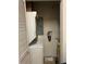 Stacked washer and dryer with hot water heater in condo unit at 12849 Madison Pointe Cir # 204, Orlando, FL 32821