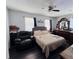 A comfortable bedroom with a dresser and accent chair at 2073 Cr 428, Lake Panasoffkee, FL 33538