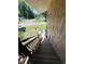 Staircase leading to backyard from porch at 2073 Cr 428, Lake Panasoffkee, FL 33538