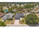 Aerial view of the home in a neighborhood with mature trees at 181 Osprey Heights Dr, Winter Haven, FL 33880
