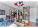 Unique bedroom featuring wall decor and decoratively organized personal items at 181 Osprey Heights Dr, Winter Haven, FL 33880