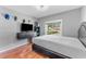 Cozy bedroom with a window view and stylish decor for a comfortable living space at 181 Osprey Heights Dr, Winter Haven, FL 33880
