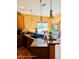 Kitchen area with pendant lighting and bar seating, ideal for casual dining and entertaining at 1895 Snapper Dr, Kissimmee, FL 34759