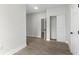 Spacious bedroom with ample natural light, neutral colors, and closet for storage at 630 Pear St, Lakeland, FL 33815