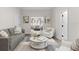 Inviting living room with modern decor, comfortable seating, and seamless open floorplan at 630 Pear St, Lakeland, FL 33815