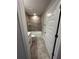 Modern bathroom with tiled shower-tub combination, vanity with granite countertop, and stylish fixtures at 1265 Groveland Ln, Lakeland, FL 33811