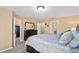 Spacious bedroom with a large bed, soft carpet, and walk-in closet, designed for comfort and relaxation at 2417 Passamonte Dr # 1E, Winter Park, FL 32792