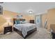 Serene bedroom with a cozy bed, soft carpet, and ample natural light from the window at 2417 Passamonte Dr # 1E, Winter Park, FL 32792