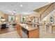 Inviting living space featuring an open floor plan connecting kitchen and living areas, perfect for entertaining at 2417 Passamonte Dr # 1E, Winter Park, FL 32792