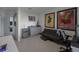 Bedroom featuring posters, a sink with cabinets, and tile floors at 5189 Greenheart Ave, Mount Dora, FL 32757