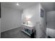Upstairs hallway featuring carpet, access to rooms, and natural light at 5189 Greenheart Ave, Mount Dora, FL 32757